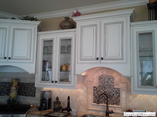 Finished kitchen with white painted cabinets - project photo from the business's own gallery
